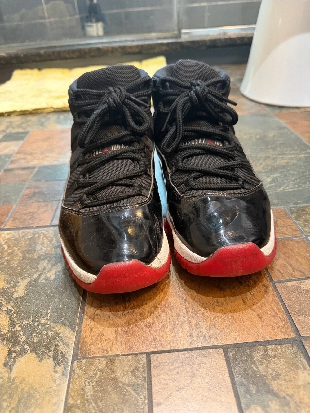 Jordan 11 Black and Red Basketball Sneakers